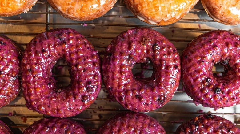 Rows of fresh donuts