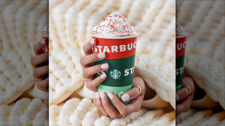 Hands holding White Chocolate Mocha