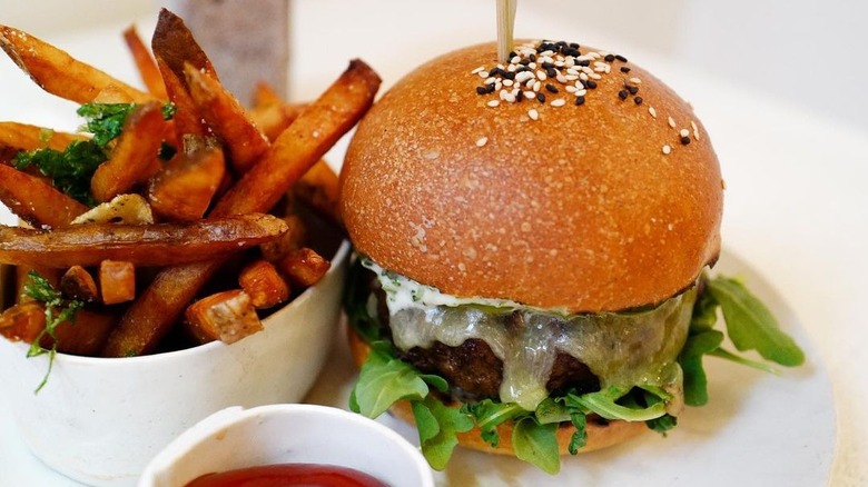 burger and fries on plate