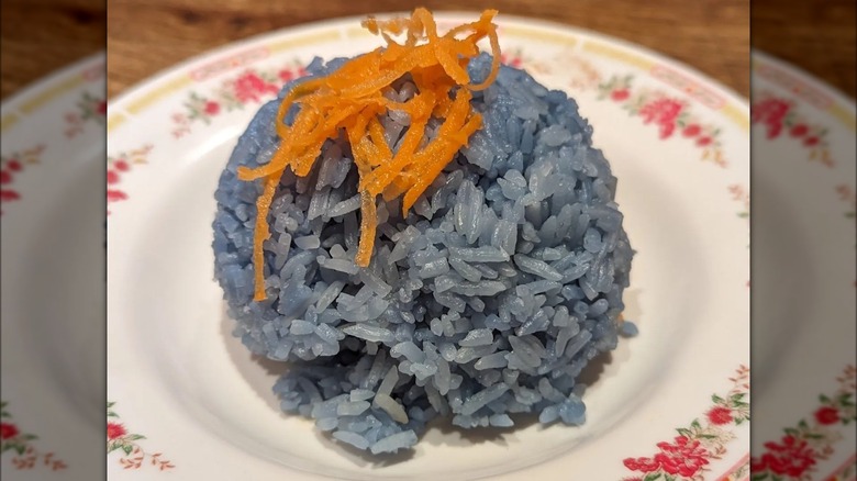 scoop of blue jasmine rice on plate