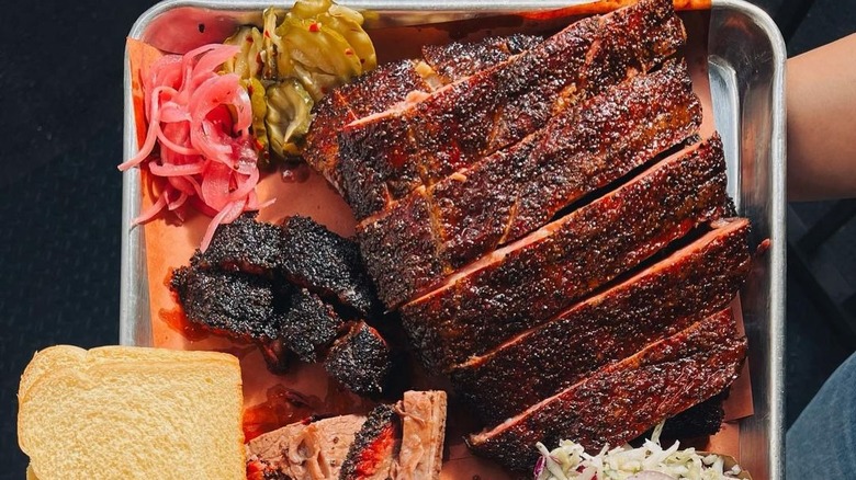 Platter of barbecue with sides