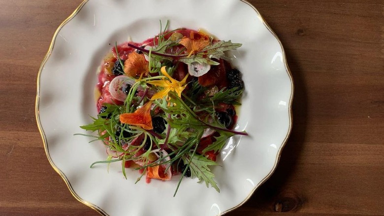 Lamb tartare with blueberries