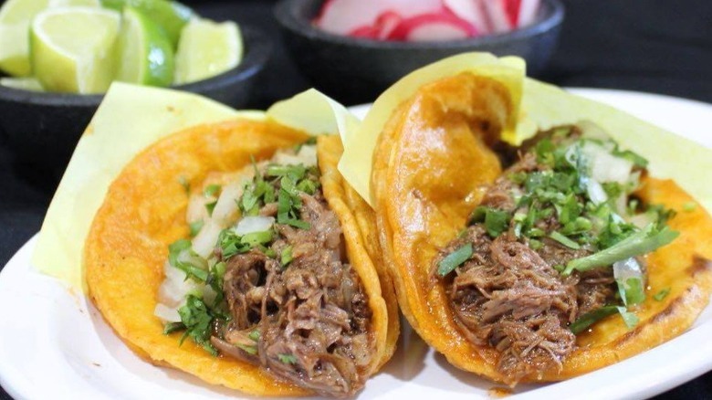 Two birria tacos 