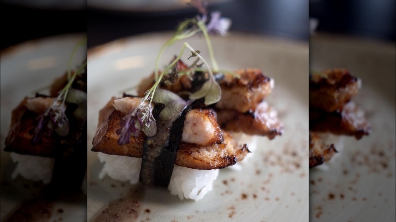 Eel nigiri with garnish 