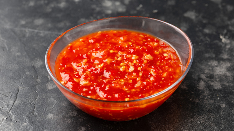 Red cocktail sauce in a white dish
