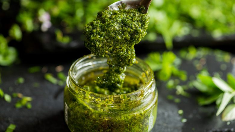 Jar of pesto on a counter
