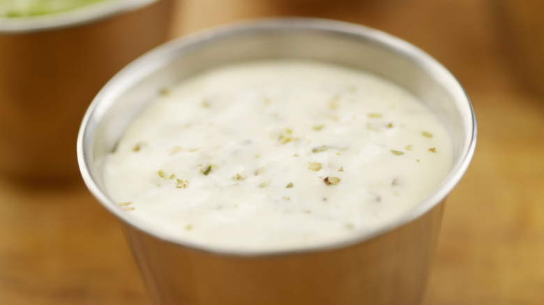 Ranch dressing in a silver cup