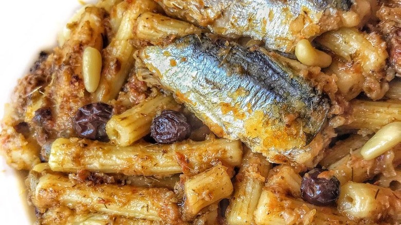 Pasta with sardines on plate