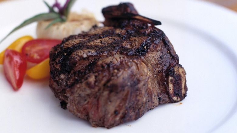 Steak and vegetables on plate 