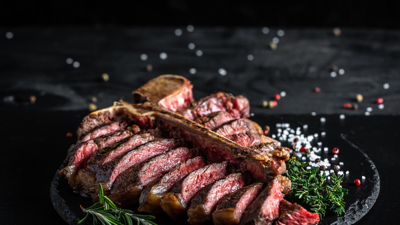 Steak and rosemary on plate