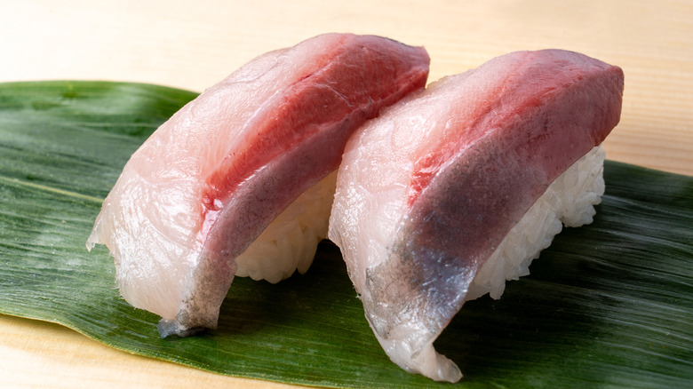 Raw amberjack sushi on plate