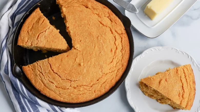 Cornbread with slice on plate