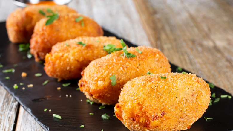 Croquettes on slate board