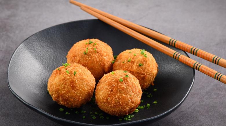 Fish balls in black bowl