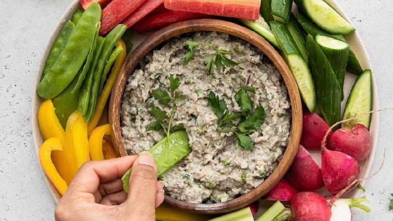 Dip surrounded by vegetables