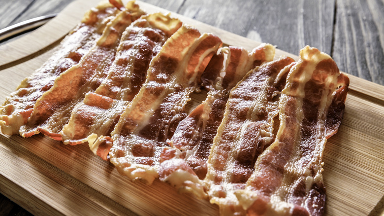 Bacon on wooden board