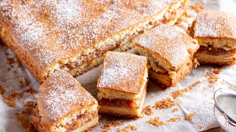 Layered apple cake on towel