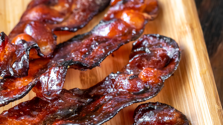 Glazed bacon on board