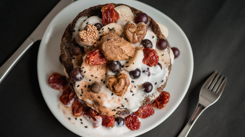 Pancakes with toppings and spread