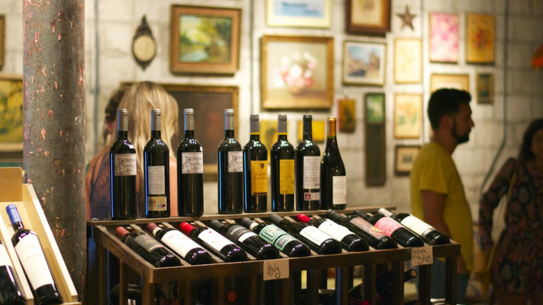 Bottles of wine lined up at Lagniappe