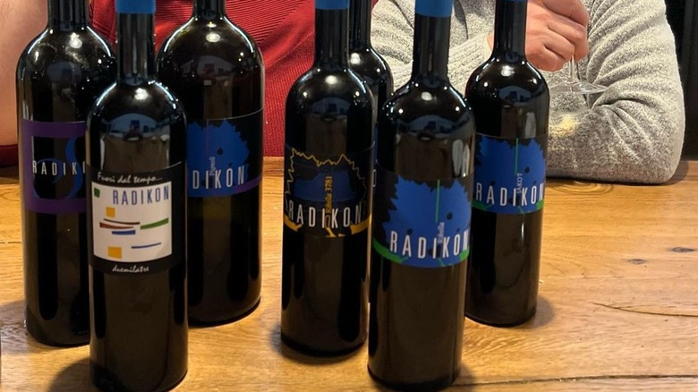 Radikon wine bottles on table