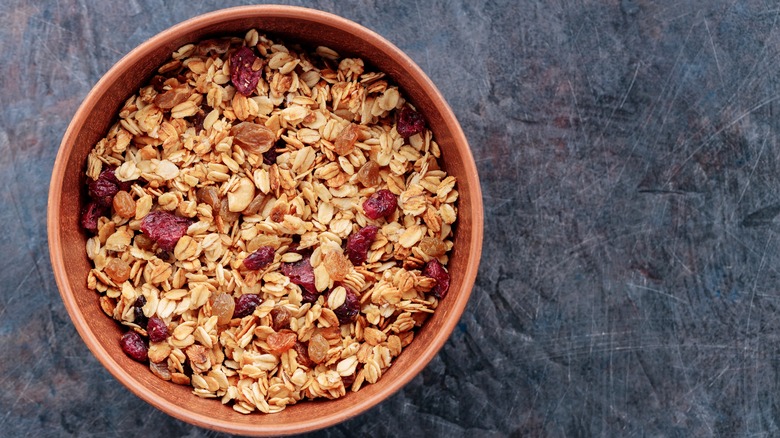 Bowl of granola grey background