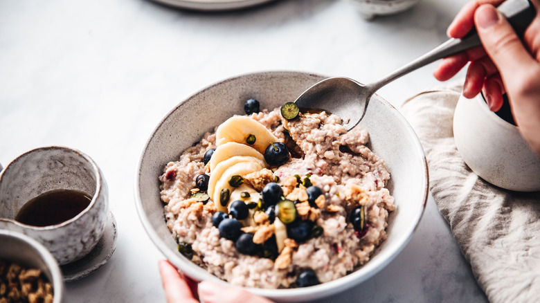 Oatmeal in bowl with spoon