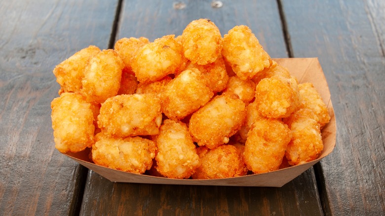 Tater tots in food basket