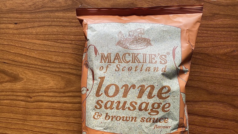 Mackie's Lorne sausage chips bag wooden table