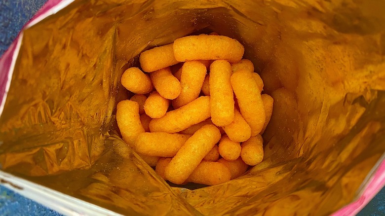 Inside bag of Walkers orange wotsits