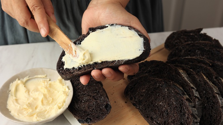 Spreading fromage blanc on bread