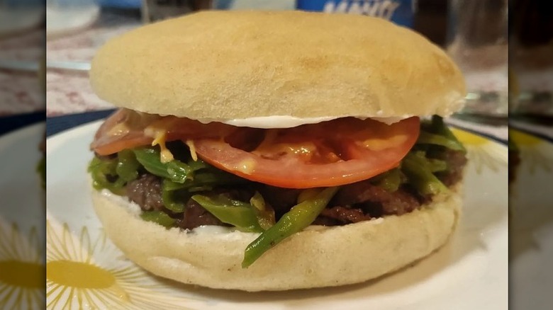 steak sandwich with green beans