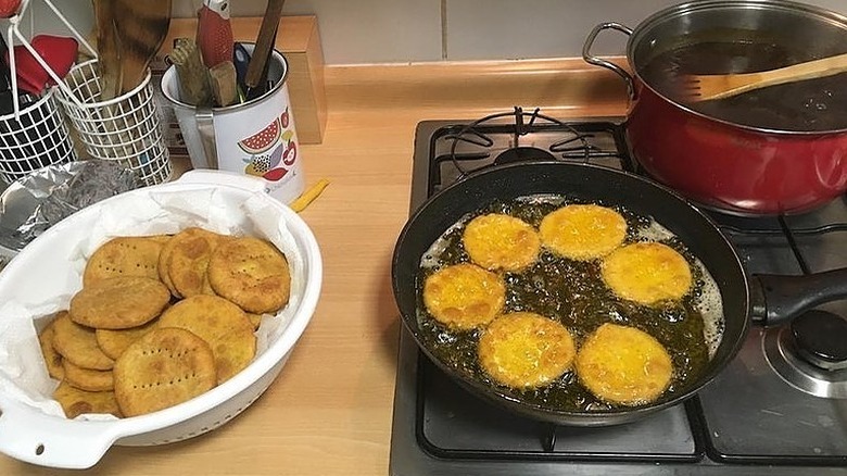 frying Chilean sopaipillas