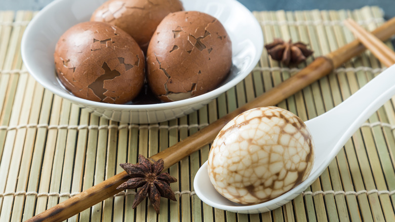 Peeled tea egg in spoon