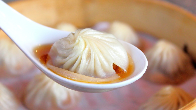 Xiao long bao in spoon