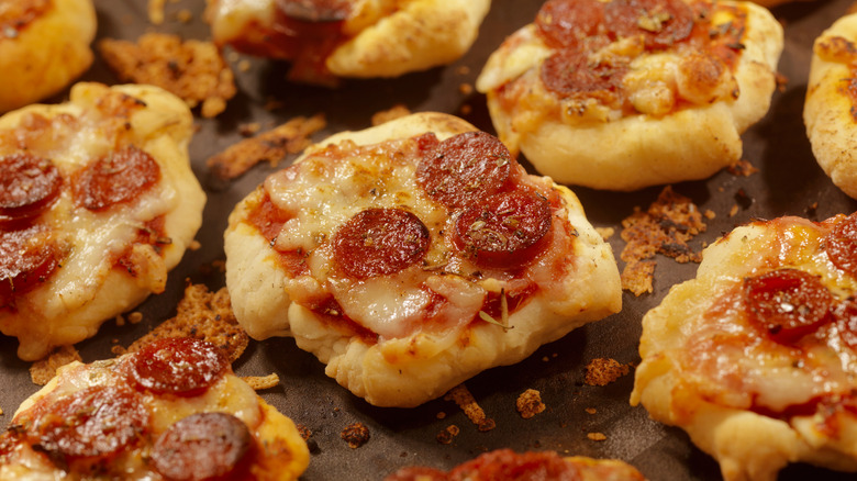 Pizzas with pepperoni and cheese