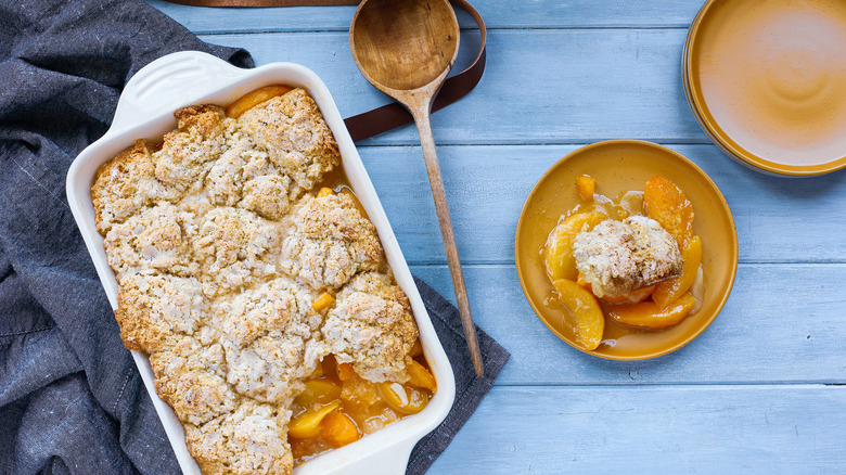 Biscuit dough peach cobbler dish