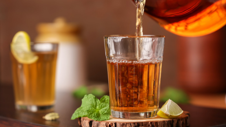 Black tea poured into glass