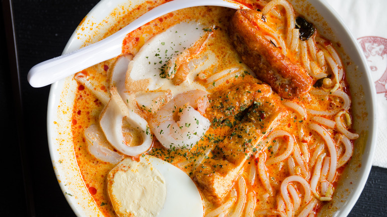 white bowl with noodles seafood