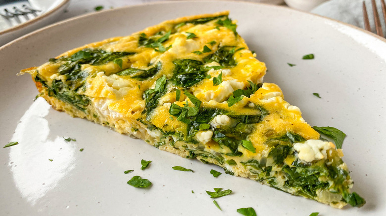 spinach frittata slice on plate