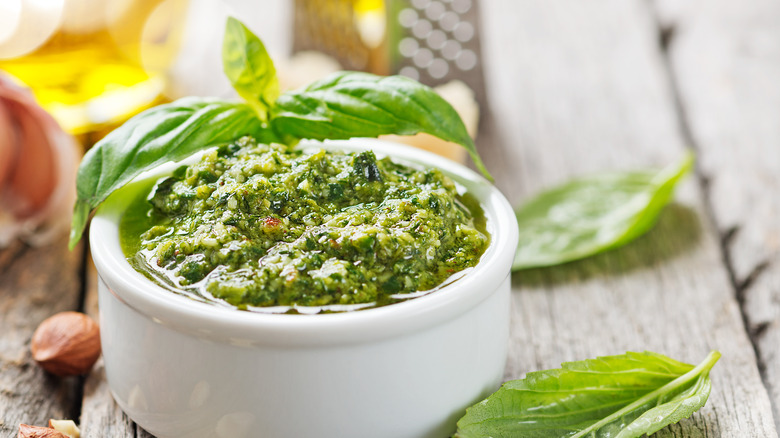 Basil pesto in white bowl