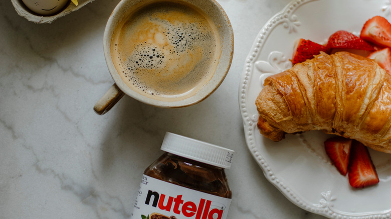 Nutella, coffee, and croissant