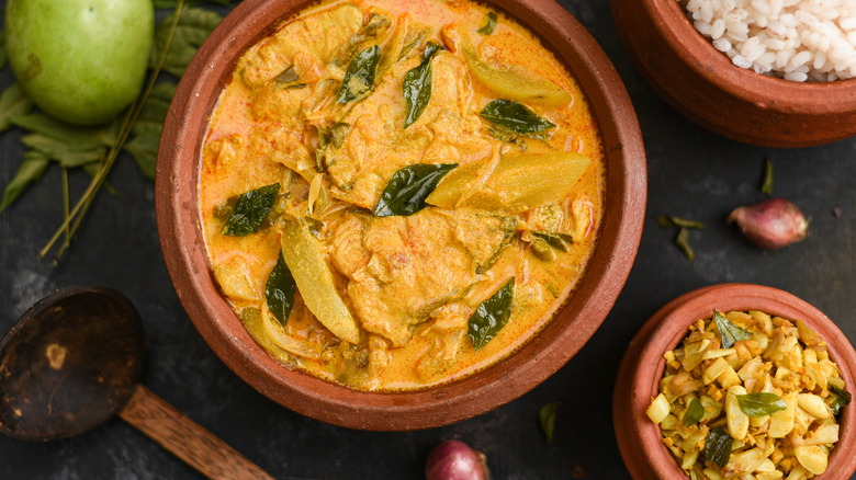 Goan fish curry in a clay bowl