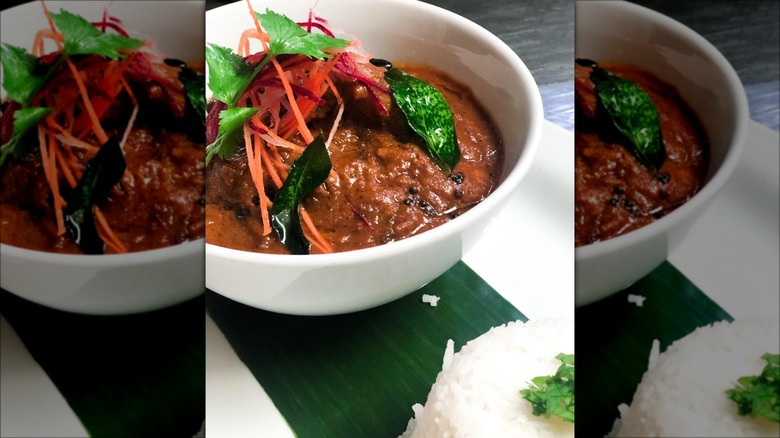 Karaikudi chicken curry in a bowl with rice