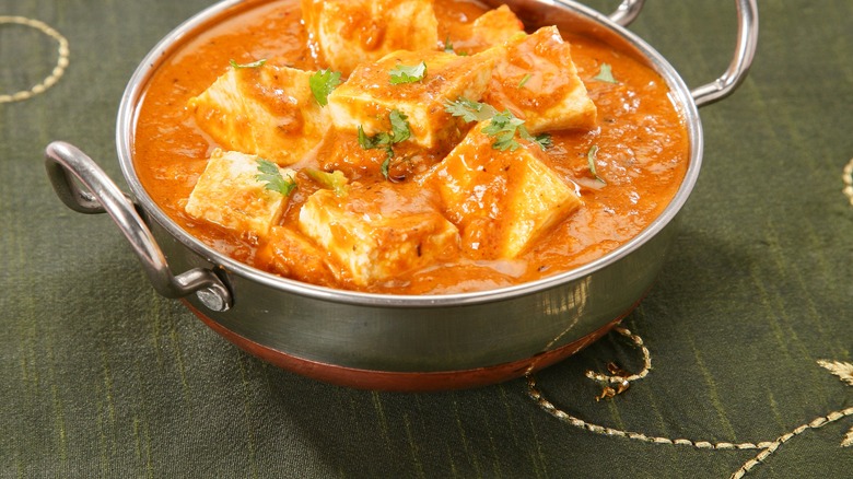 Shahi paneer in a metal dish