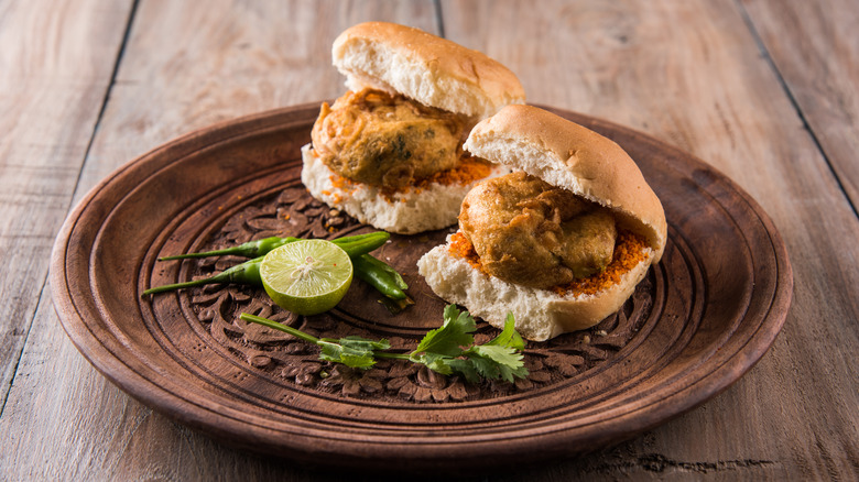 Vada pav burgers on a wooden plate