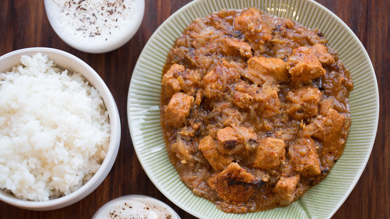 pork vindaloo dish with rice