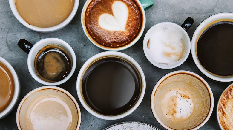 different cups of coffe filled up with coffee