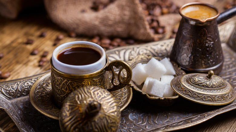 Turkish coffee on a tray with sugar cubes