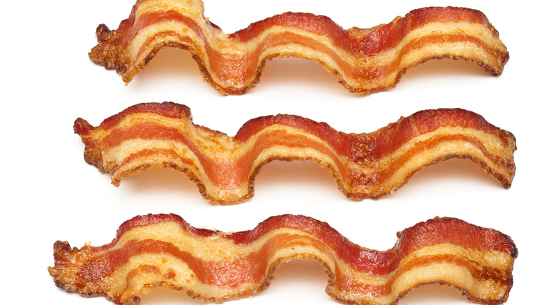 Bacon strips on white background